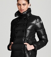 Moncler's lacquered Daim coat boasts a forward asymmetrical zip front and a decorative, double breasted silhouette.