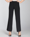 Elegant and totally sophisticated, INC's wide-leg crepe trousers feature a concealed closure and minimal pockets for a sleek look.