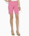 Updated for the season in a bright, cheerful hue, these Lauren by Ralph Lauren shorts are designed from crisp cotton twill for stylish comfort and casual appeal.