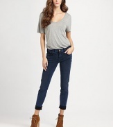 Acid-wash makes a comeback in ultra slim-fit denim, cuffed at the hem for effortless-chic.THE FITFitted through hips and thighsRise, about 8Inseam, about 31THE DETAILSZip flyFive-pocket style98% cotton/2% elastaneMachine washMade in USA of imported fabricModel shown is 5'11 (180cm) wearing US size 4.