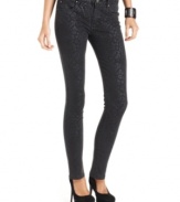 Reinvent your look with these on-trend skinny jeans, featuring a subtle, tonal animal print. From DKNY Jeans.