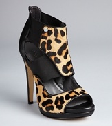 Calvin Klein has stepped up to the leopard trend with luxe high heel sandals that will make you the cat's meow.