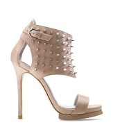 Super spiky studs offer tough-girl appeal to these edgy harness sandals from Camilla Skovgaard.