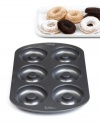 Get 'em while they're hot! Feast on your favorite morning pick-me-up right in the comfort of your home with this durable, nonstick solution to making masterpiece doughnuts in minutes. The healthier and tastier alternative to fried doughnuts, baked doughnuts are quick and easy to create and clean-up is fast with this dishwasher-safe pan. 10-year warranty.