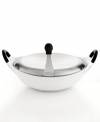 A new look. Give your kitchen a modern update with this incredibly light and sophisticated cast aluminum covered wok. Providing fast & even heat distribution, the sleek vessel features a phenolic resin stay-cool handle, easy-pour spout and a striking silhouette that creates an art show on the stovetop. 3-year warranty.