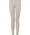 Sumptuously soft and effortlessly cool, Donna Karans pure, beige cashmere blend knit leggings epitomize understated luxury - Crafted with a touch of flattering stretch material - Curve-hugging, medium-rise pull on style with elasticated waist - All-over fine ribbing and cuffed ankles - A must for chic off duty looks - Pair with oversize pullovers, long white button downs and tunic tops