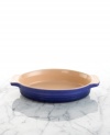 Prepare everything from peach cobbler to macaroni and cheese in this durable stoneware dish. Its practical shape and innovative surface goes from freezer to oven or microwave to the table for serving. Resists stains, cracks and odor retention. Side handles.