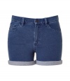 Chic denim shorts from See by Chloe - These figure-enhancing shorts channel the must-emulate look of the moment - Classic five-pocket styling, slim fit, rolled hem - Pair with ribbed tights and a pullover for cold-weather cool or with a tunic top and platforms for springtime chic
