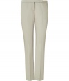 Stylish pants in fine beige stretch cotton - Wonderfully comfortable thanks to spandex - Short cuff with side pockets - Figure-flattering creases create slim look - Classic office or evening trousers, have mix of serious and modern - Pair with a matching blazer, silk blouse and heels