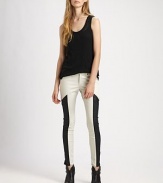 Shift into high-fashion gear with these leggings-style skinnies, defined by contrasting side panels that evoke a sporty vibe. THE FITRise, about 8Inseam, about 30THE DETAILSZip flyFive-pocket styleBody: Cotton/polyurethaneTrim: LeatherMachine washMade in USA of imported fabricModel shown is 5'11 (178cm) wearing US size 4.