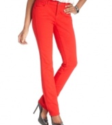 Clever side seams fool the eye in this completely flattering denim look from DKNY Jeans. In fashion-forward red, these skinnies make a chic statement.