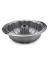 Beautify your bundts with the Anolon 9.5 fluted mold pan! New proprietary coating ensures superior release and makes cleanup a snap. Silicon-enhanced handles are steady and slip-free, while the pan's substantial weight provides durability and helps prevent warping.