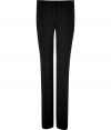 Luxe trousers in fine, black virgin wool stretch blend - Slim, streamlined silhouette - Crease detail from thigh to hem flatters and elongates the leg - Gently flared boot cut - Single welt button pockets at rear - Medium-low rise, with zip fly and tab closure - Perfect for work and play - Style with a blazer and silk blouse by day, and dress up with a sequin top and cropped leather jacket at night