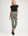 Sophisticated pleats, high rise and a vivacious tribal print define these cropped, crepe de chine pants. Side zipperSlash pocketsRise, about 12Inseam, about 25Fully linedPolyesterDry cleanMade in USA of imported fabricModel shown is 5'10 (177cm) wearing US size 2.