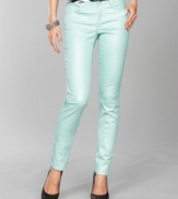 The sparkly, ice-blue fabric of INC's petite skinny jeans is sure to make heads turn!
