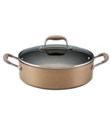 Ideal for entertaining guests, this bronze beauty goes from stove or oven to table effortlessly. A heavy gauge, hard-anodized aluminum exterior heats evenly without hot spots, and the DuPont Autograph® 2 nonstick finish coats the inside and outside for superior food release, cleanup and durability. Lifetime warranty.