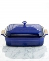 The culinary possibilities are virtually endless with this versatile rectangular baker as part of your kitchen. This gorgeous heavy-duty baker is constructed of scratch-resistant stoneware, a non-porous enameled material that's perfect for preparation, serving and storage for a true all-in-one meal anyone could love. Limited lifetime warranty.