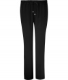 Stylish pants in fine, black viscose blend - Relaxed slim silhouette, on-trend ankle-cropped length - Medium low rise with drawstring, elasticated waist and side pockets - Versatile and casually cool, easily dressed up or down - Pair with a silk top and strappy sandals, or go for a more casual look with a t-shirt, cardigan and sandals