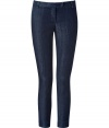 Dark blue stretch cotton denim - Vertical streaked wash - Low rise - Cropped above ankle - Chino-style tab waist detail and back pockets - Feminine cut with simple, masculine styling - Pair with cashmere pullovers, button downs and ballerina flats